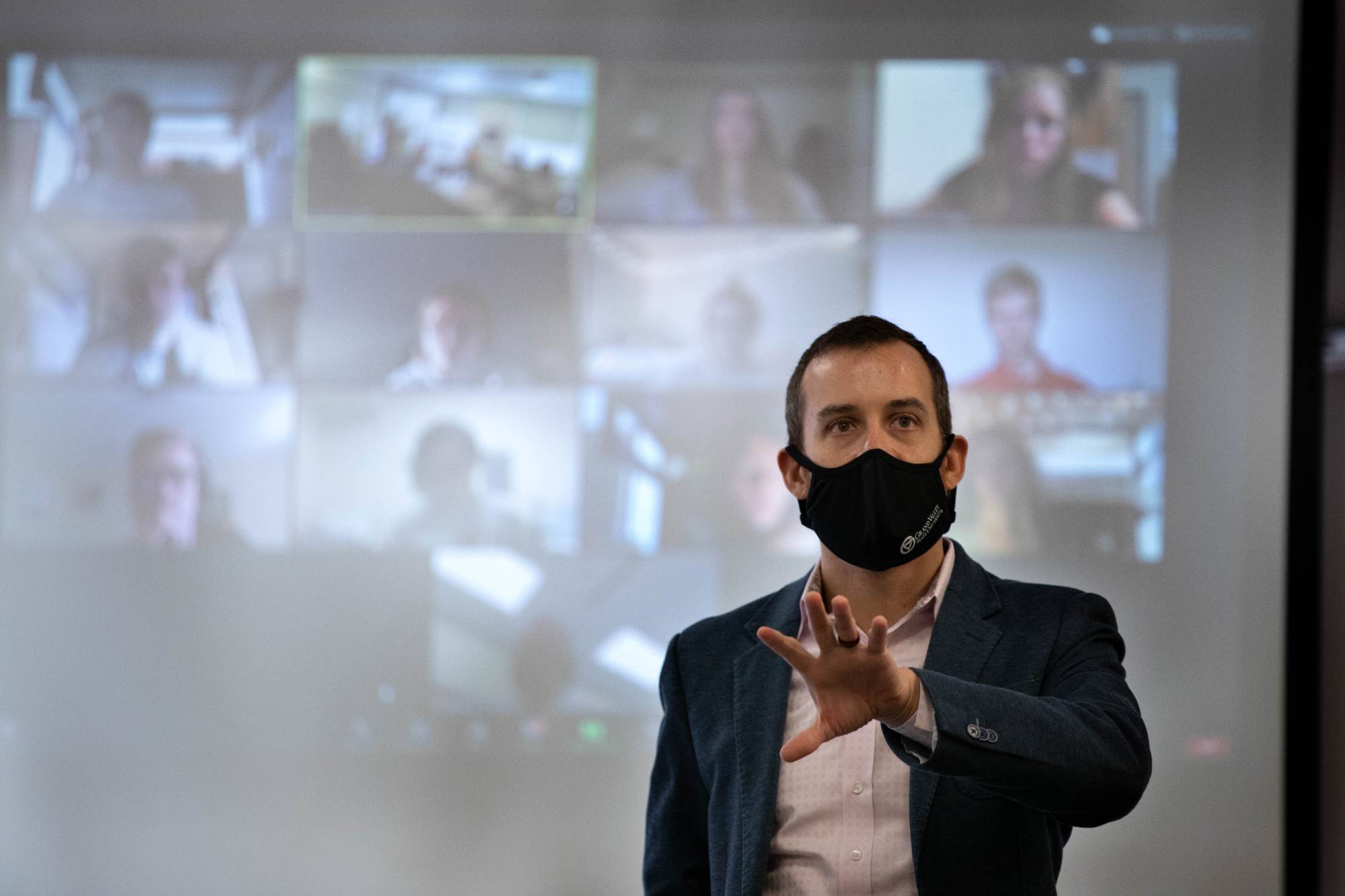 Cataldo teaching in mask